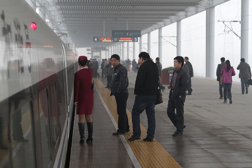 Smokers inhale their last puff at Xinxiang East Railway Station
