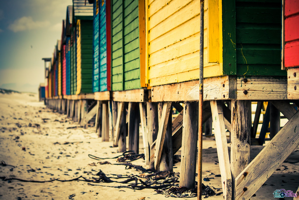 Colourful beach huts at Muizenberg Beach, Cape Town.