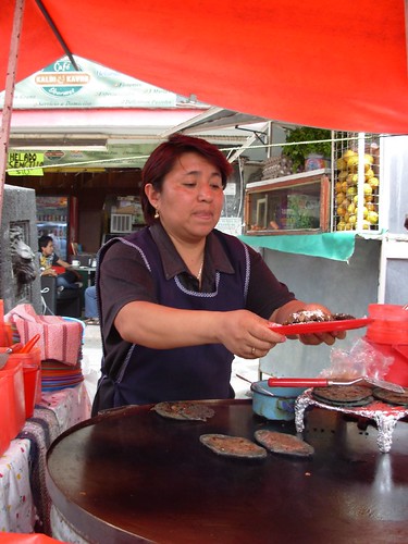 A street vendor selling blue corn huaraches in Mexico City