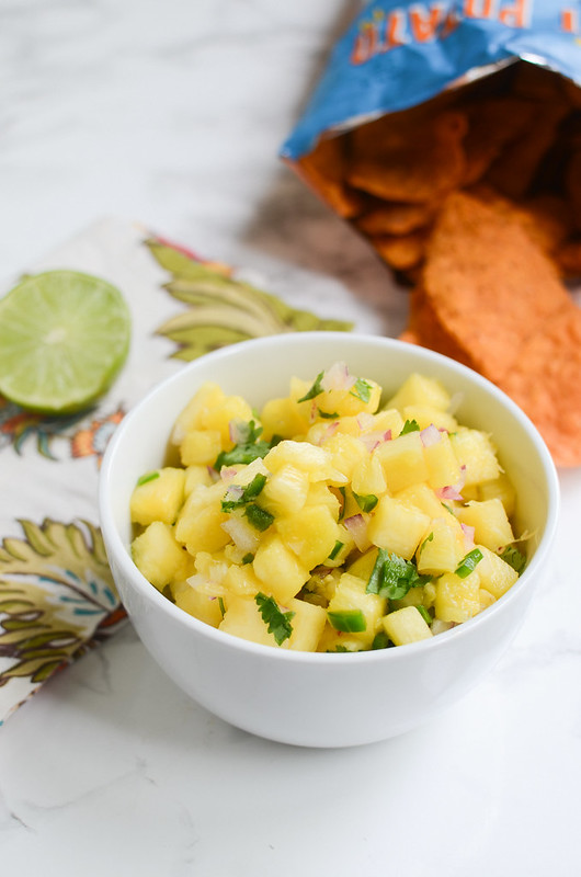 Pineapple Salsa - perfect on tacos, burritos, or just with tortilla chips! Really easy and really delicious!