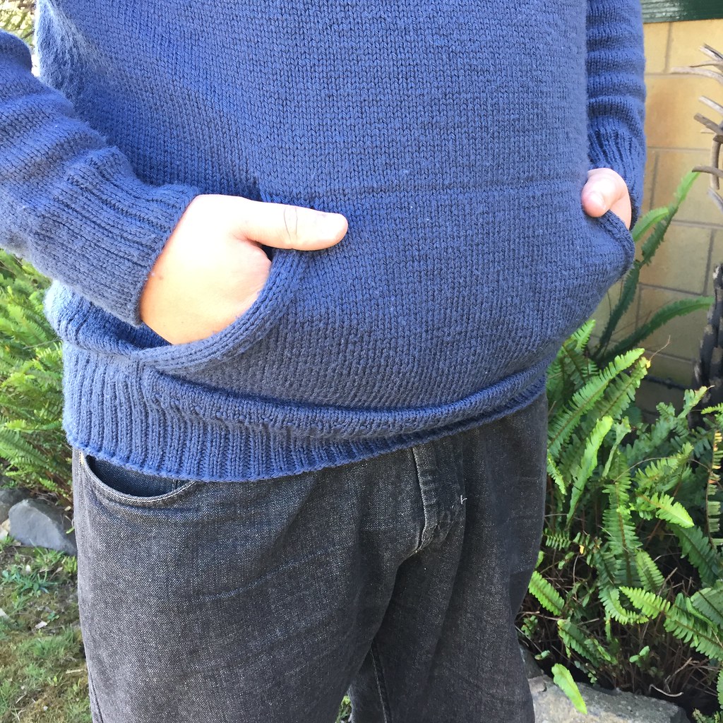 close up of seamlessly knitted pocket on bb's jumper