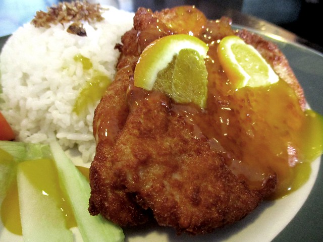 Le Cafe pork chop with orange sauce & rice