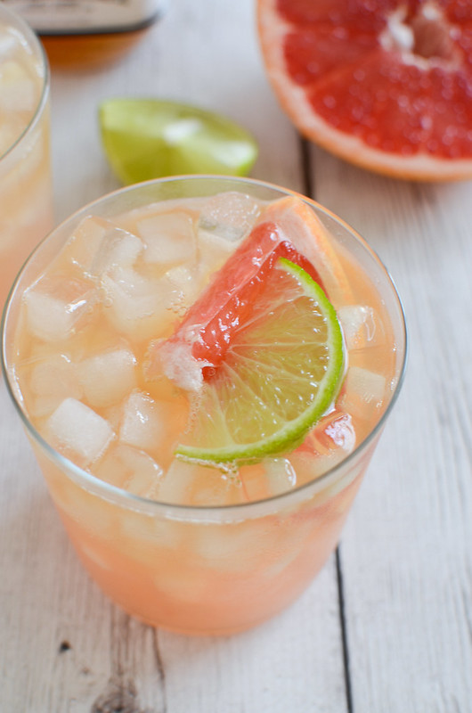 Grapefruit-Ginger Bourbon Sour - fresh grapefruit juice, lime juice, Bourbon, and an easy homemade ginger simple syrup. The most delicious tart and sweet cocktail recipe!