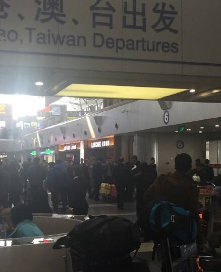 Men at the airport terminal T2 set off firecrackers was taken away by police