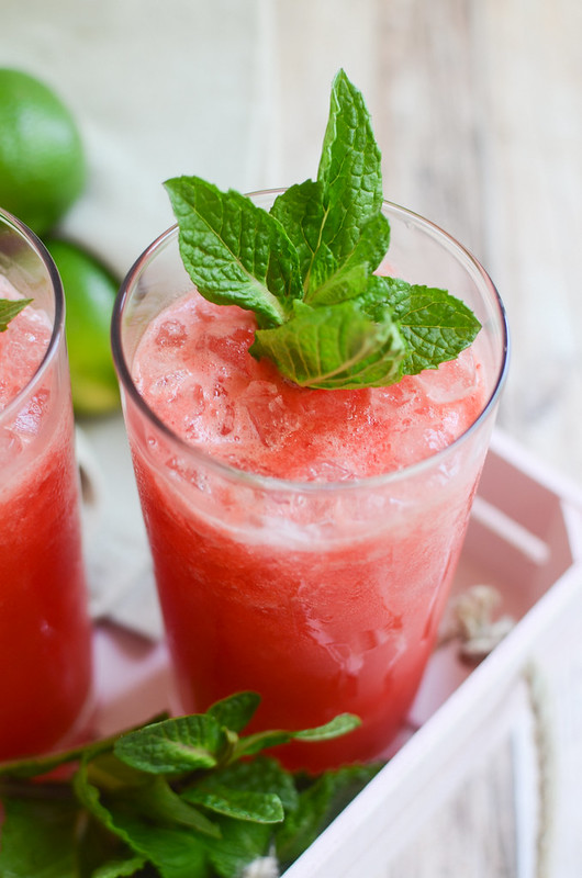 Watermelon Mint Margaritas - the most refreshing summer cocktail! Fresh watrmelon is blended with tequila, lime juice, and an easy homemade mint simple syrup. These margaritas are so pretty and so delicious!