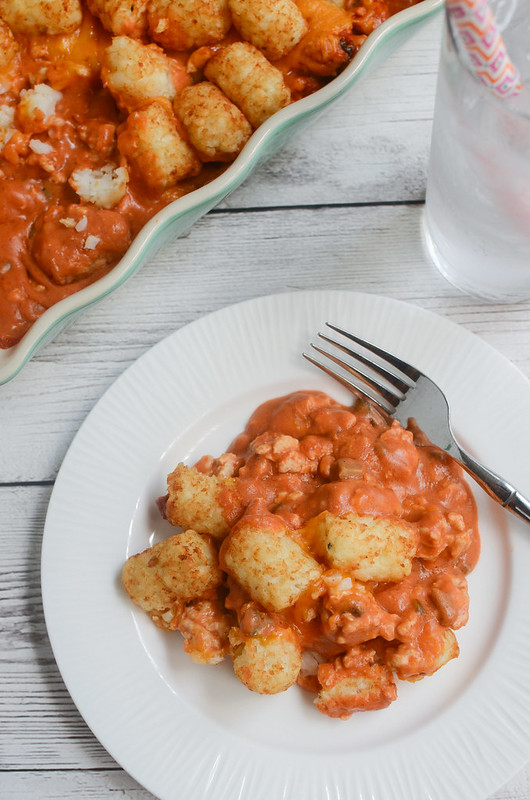 Sloppy Joe Tater Tot Casserole - easy weeknight meal! Ground beef or turkey in a delicious sloppy joe sauce topped with cheese and tater tots! Kids love this one!