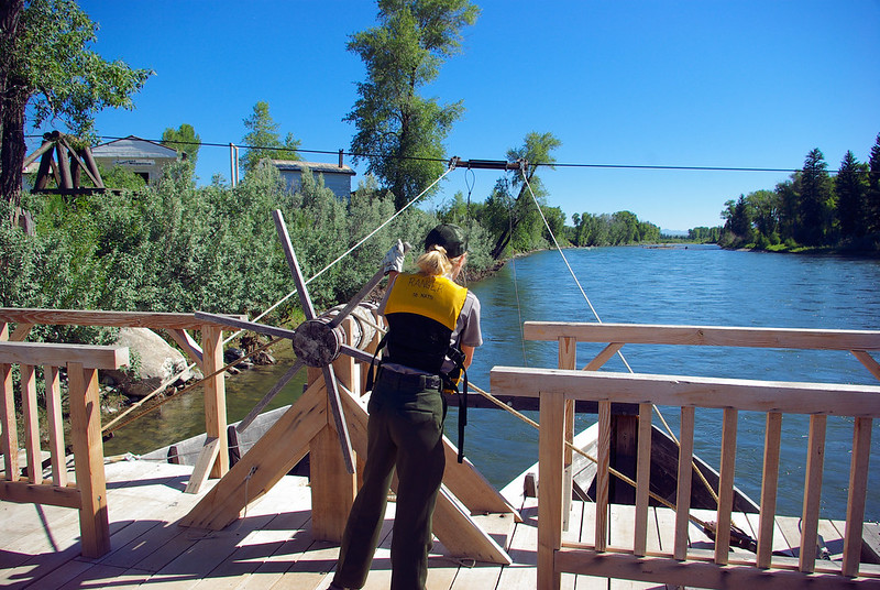 National Park Service interpretive ranger operating Menor's Ferry, Grand Teton National Park, Wyoming