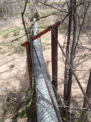 Before image of a sluice structure, flume and concrete lined ditch