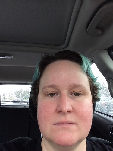 A selfie I took in my car. I am not smiling.