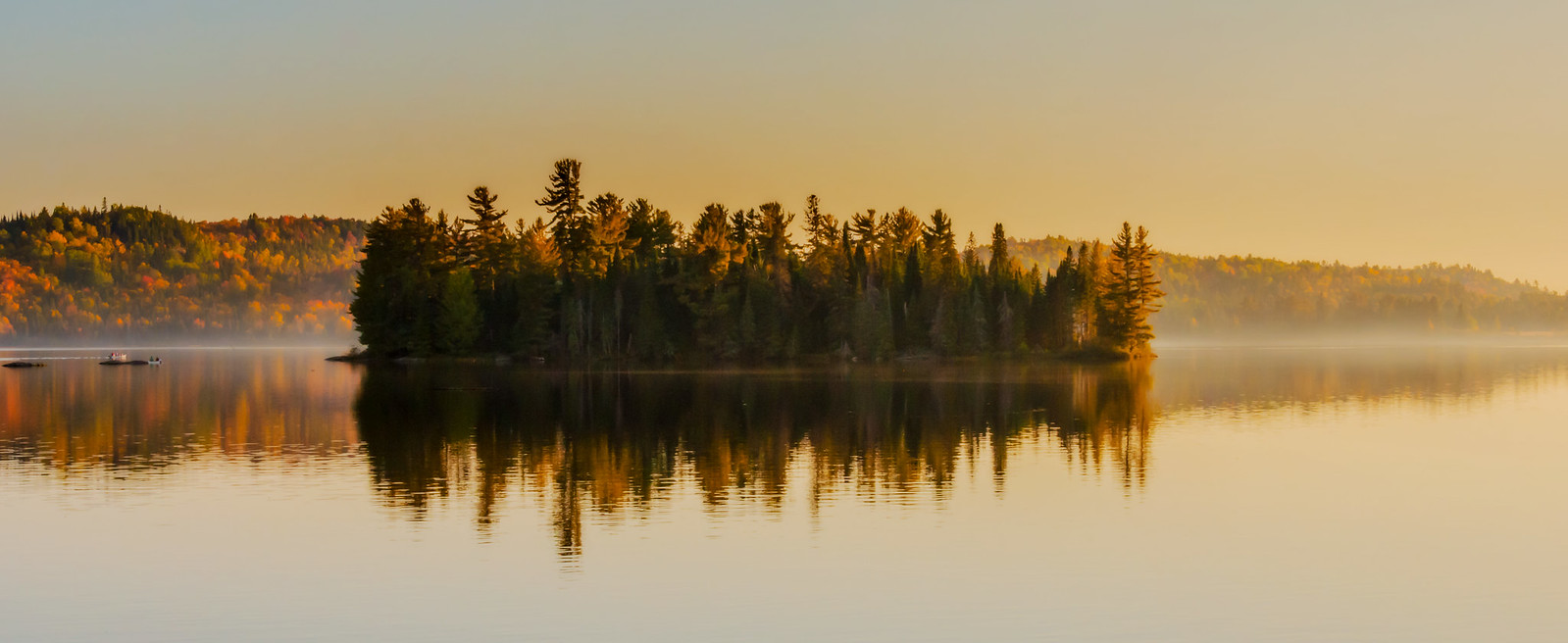 Misty lake view in the autumn in Algonquin Park, Ontario, Canada