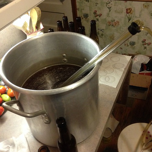 Our wit beer about to be siphoned from large pot into bottles