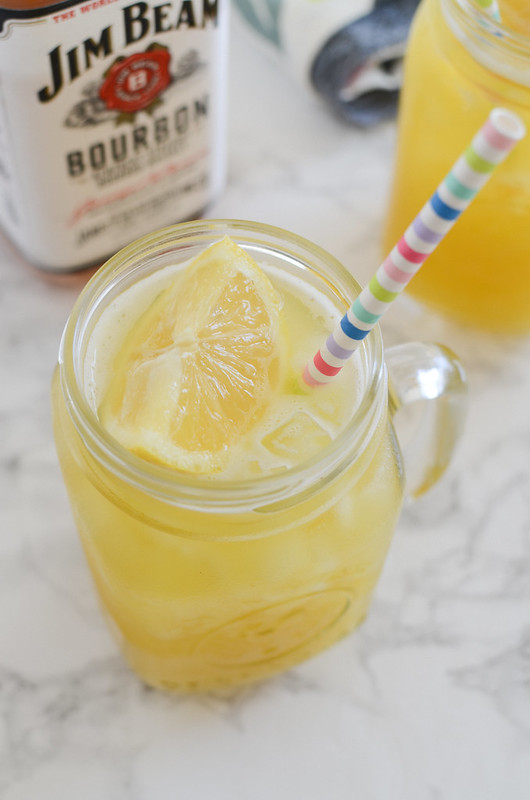 Tailgate Sipper - perfect cocktail for the Super Bowl! Fresh pineapple, bourbon, and a secret ingredient make these extra delicious!