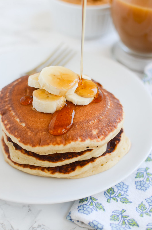 Peanut Butter Banana Pancakes - fluffy pancakes filled with creamy peanut butter and diced banana. Perfect for a relaxing weekend morning or prepping ahead for easy breakfasts all week!