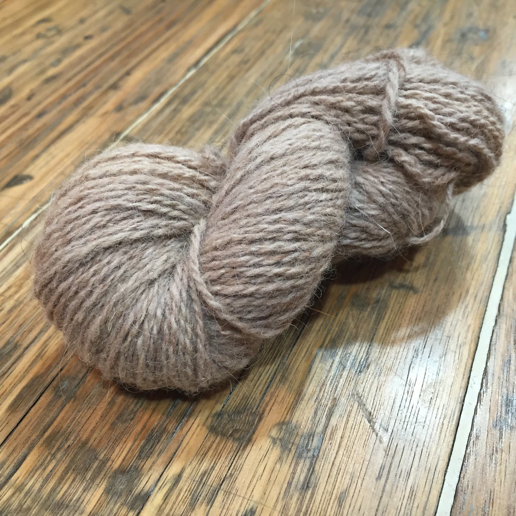 dried skein of shilasdair luxury 4 ply, solar dyed with walnut shells. now has a beautiful caramel colour