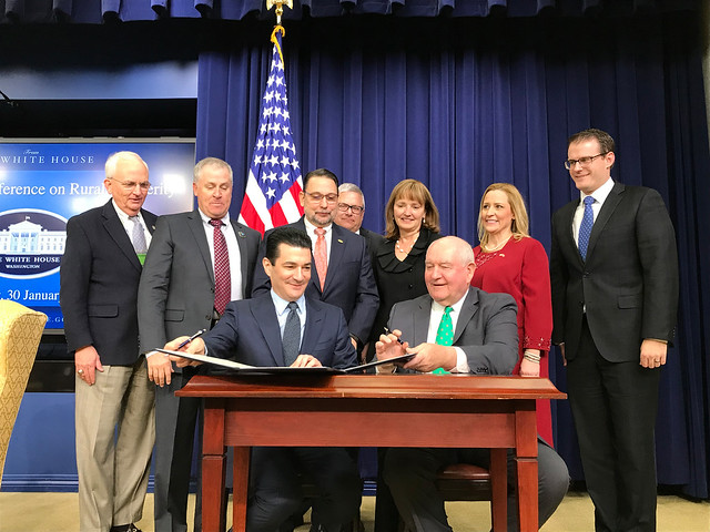 USDA Secretary Sonny Perdue and FDA Commissioner Scott Gottlieb, M.D. signing a formal agreement