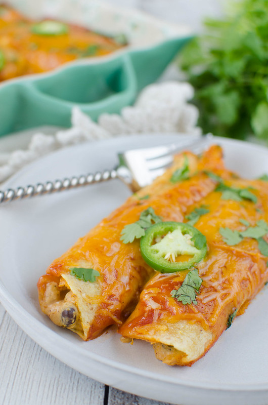 Butternut Squash and Black Bean Enchiladas - easy and delicious meatless meal! A little bit spicy, a little bit sweet. The whole family will love this recipe!
