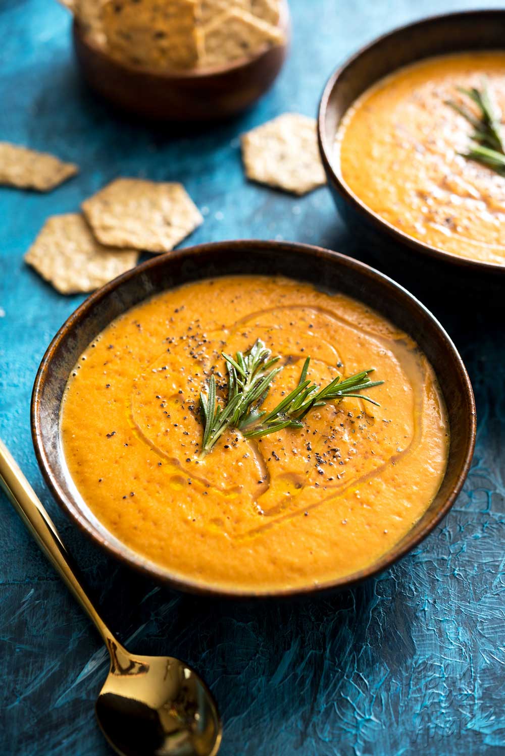 This Instant Pot tomato bisque is a great way to use up a few pound of tomatoes to make a rich and delicious dinner. Vegan, Gluten-free, Soy-free