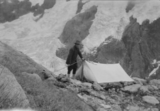 John Robert (Jack) Murrell, at a campsite next to Age Glacier, Mount Tutoko, Darran Range, Southland Region