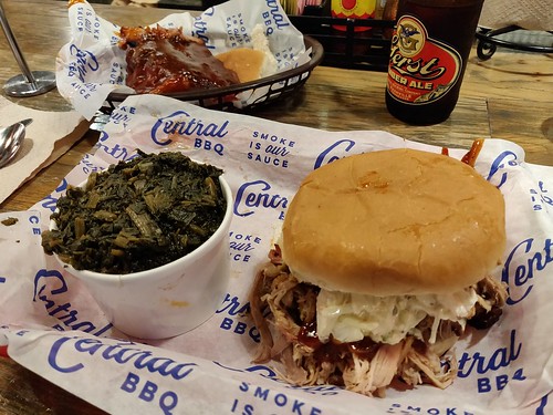 Pulled pork sandwich with ribs and turnip greens