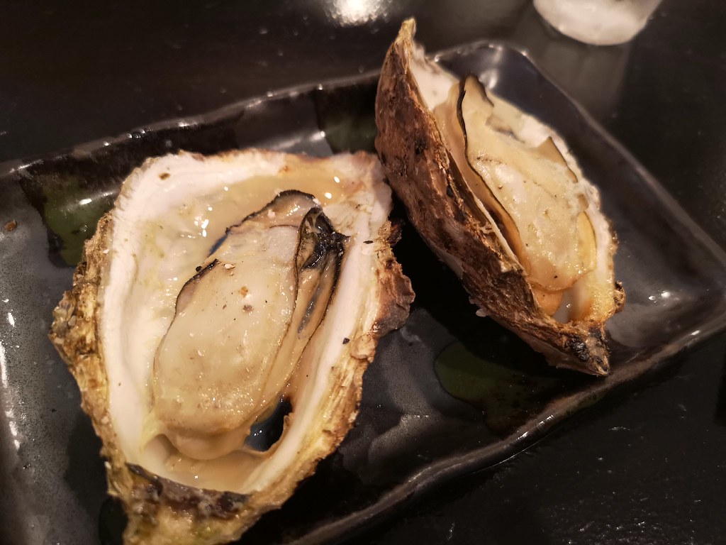 These fresh Hiroshima oysters are barbecued on a flaming charcoal pit for roughly 30 seconds before they're served, juices still bubbling.