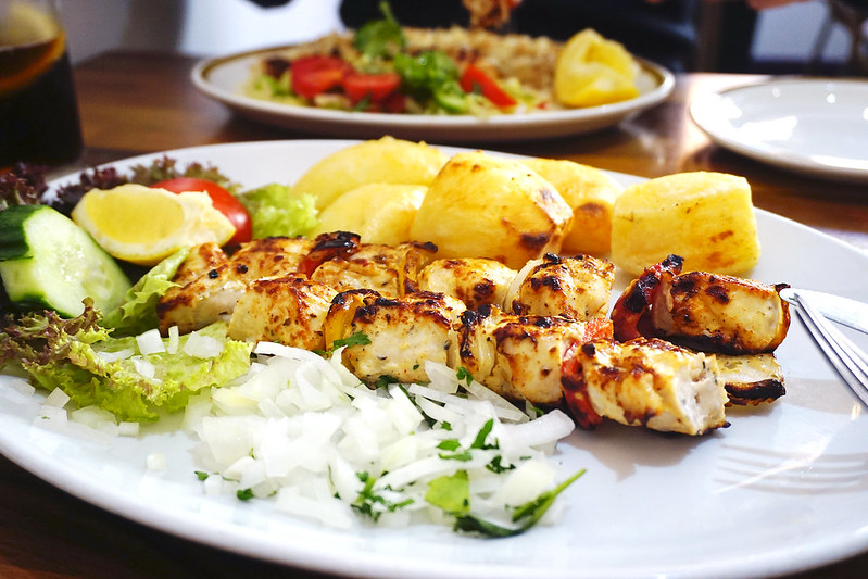 Chicken kebab, roasted potatoes, salad and onion & parsley garnish from Apollo, a Cypriot restaurant in Finsbury Park/Holloway | My Gluten Free Finsbury Park Guide | Stroud Green | North London