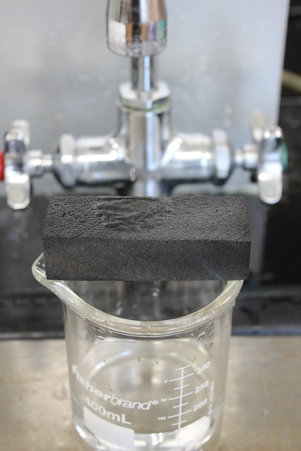 Black carbon foam on top of a jar