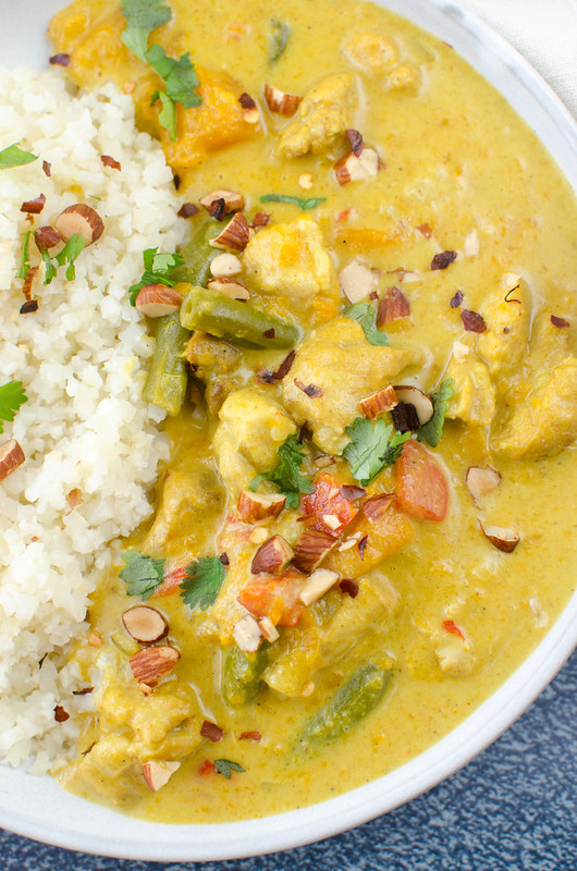 Pressure Cooker Paleo Sweet Potato Chicken Curry - chicken thighs, sweet potatoes, green beans, and peppers in a delicious coconut curry sauce. Ready in less than 30 minutes! Great for meal prep!