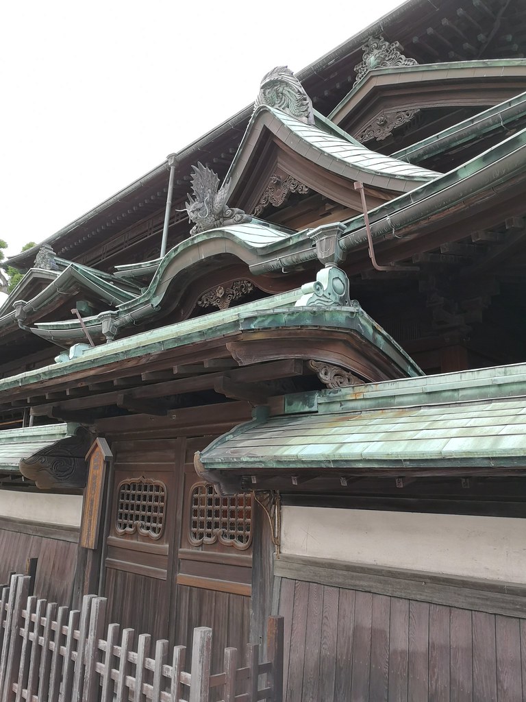 The imperial entrance to Dogo Onsen. Note the dragon and the phoenix on the gabled roofs.