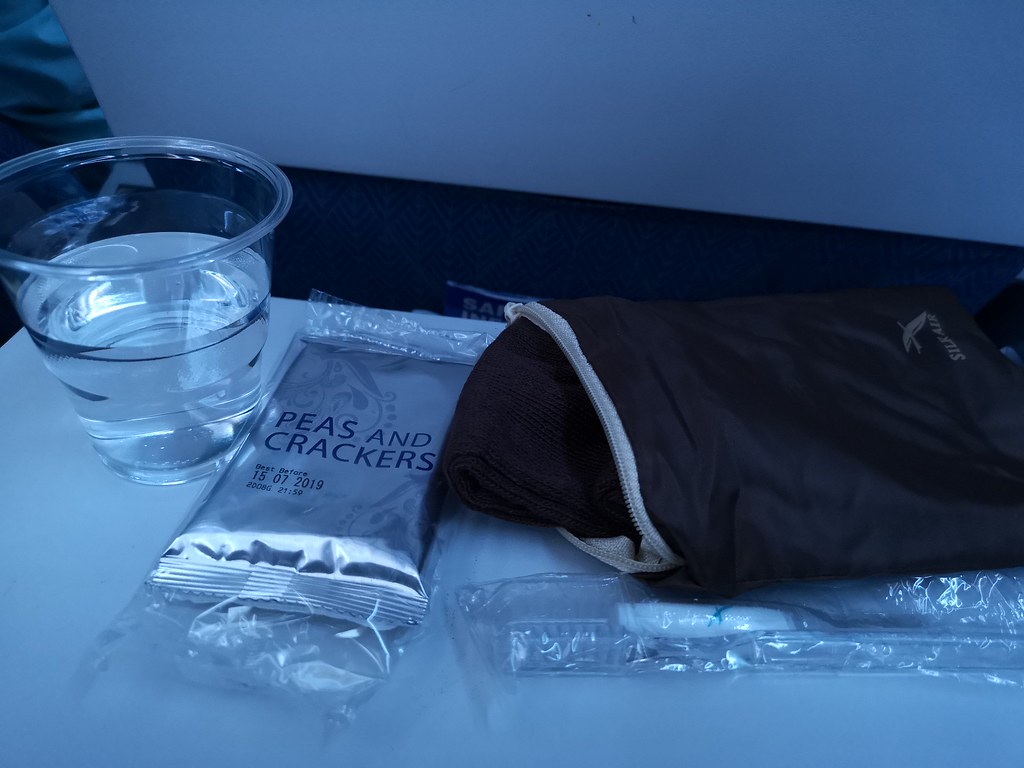 On the Economy Class red eye flight, passengers get peas and crackers and a pouch containing flight socks, toothbrush and toothpaste.