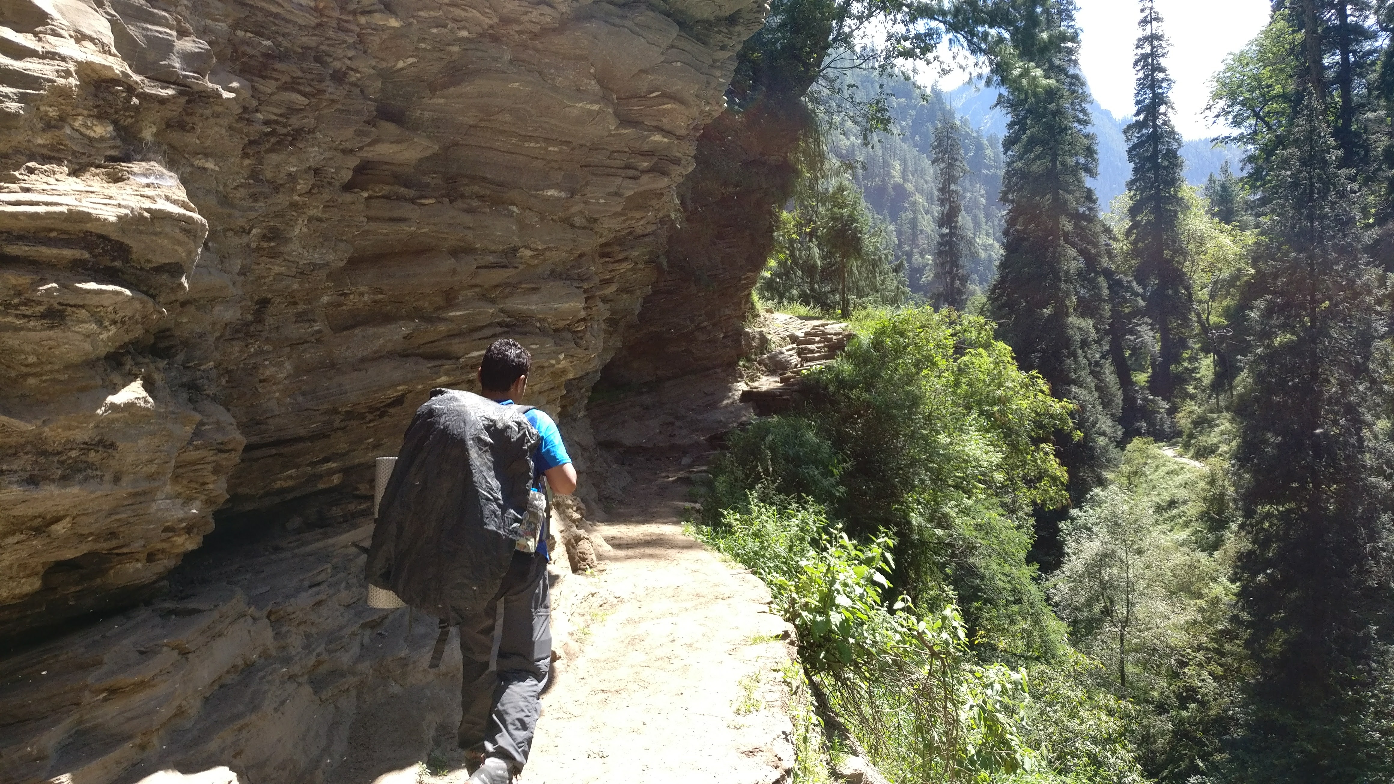 After crossing the river, the trail snakes up, beautifully carved in a near vertical face of a hill.