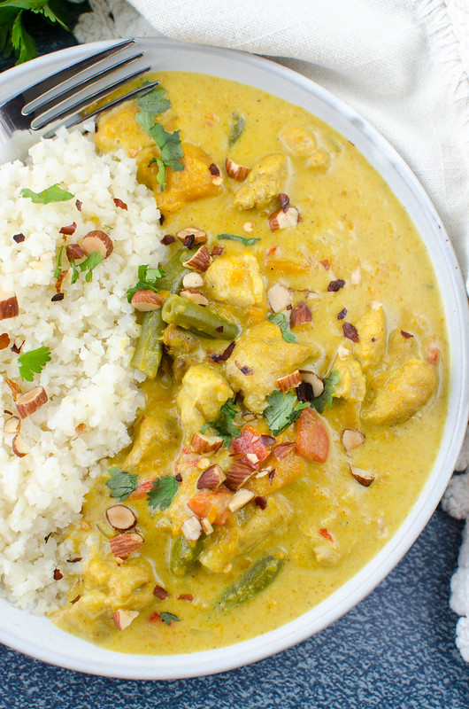 Pressure Cooker Paleo Sweet Potato Chicken Curry - chicken thighs, sweet potatoes, green beans, and peppers in a delicious coconut curry sauce. Ready in less than 30 minutes! Great for meal prep!
