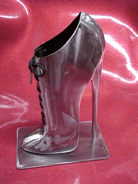 scrap metal high heel | scrap steel high heel | Flickr