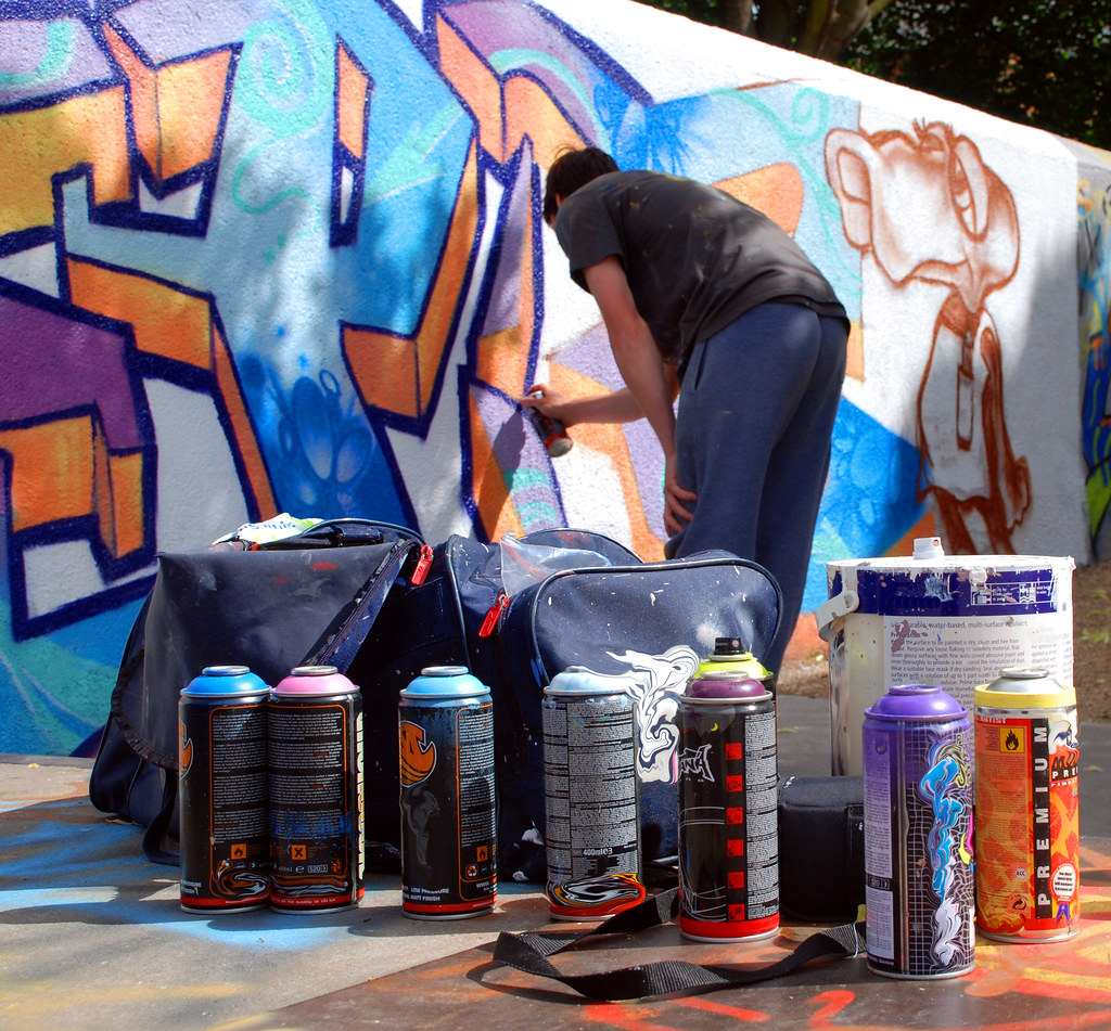 Graffiti artist at work with tools | A photograph of a graff… | Flickr