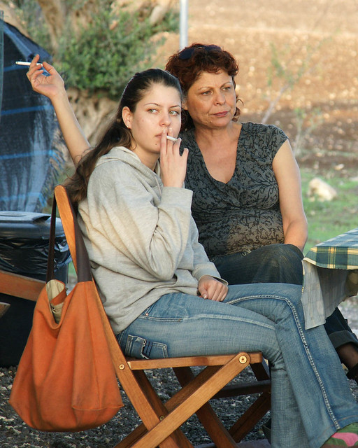 mother and daughter smoking