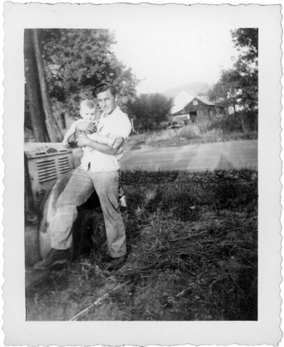 Man with baby on farm L010
