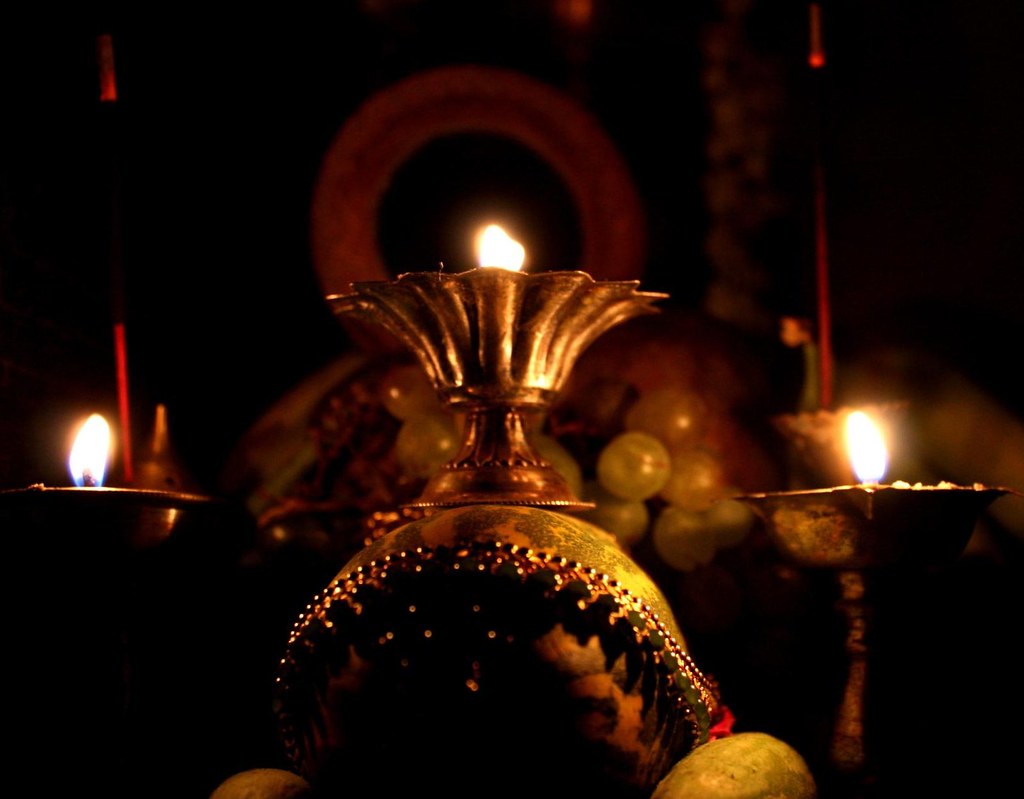 Vishu Kani arrangement of lights, fruits, mirrors, flowers and jewels