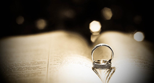 bible and wedding rings