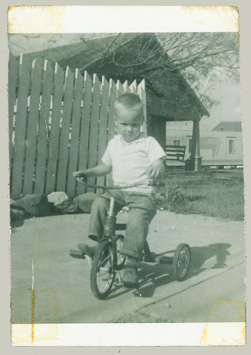 Boy and tricycle