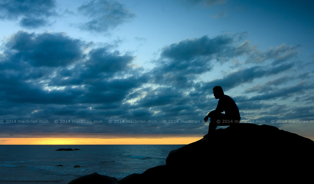 Silhouette Of A Man Sitting Down At Sunset View My Other