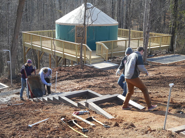 Ohio State University Alternative Spring Break Volunteers installing new steps for the yurts at Natural Tunnel State Park, Va