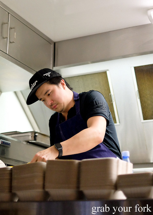 Head chef Alex Wong working onboard Yang's Malaysian Food Truck in Sydney