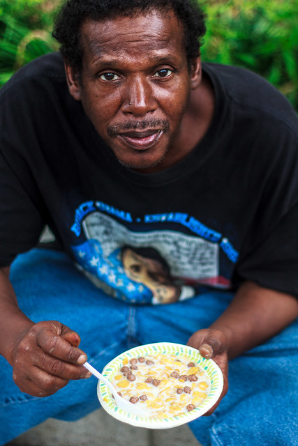 Man appreciating a bowl of cereal.