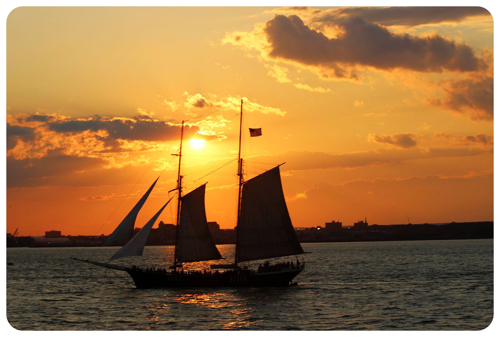 sailboat at sunset hudson river