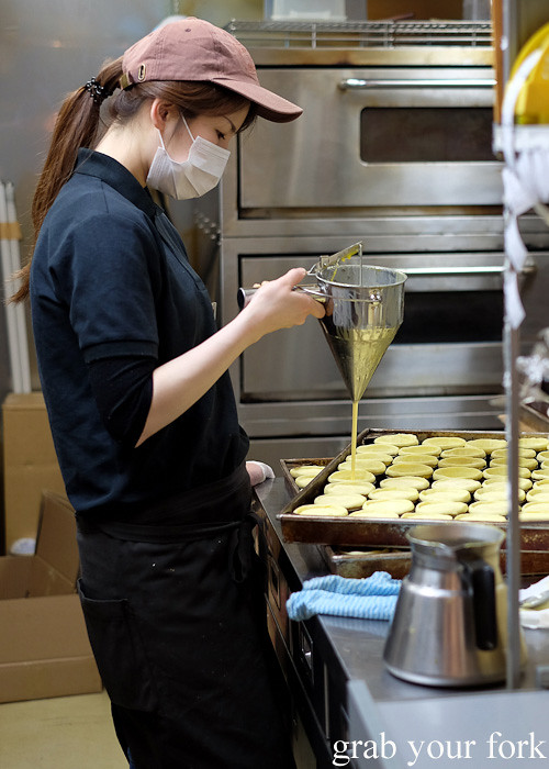 Making egg tarts at Lord Stow's Bakery in Osaka, Japan