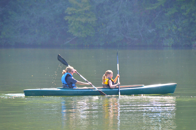 Mother-Daughter paddle a kayak at Hungry Mother State Park in Virginia