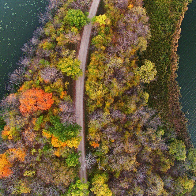 Autumn land bridge to the Maplewood State Park campground. @exploreminnesota #OnlyInMN