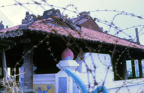 SAIGON 1970 - The Pigneau de Béhaine mausoleum viewed through barbed wire