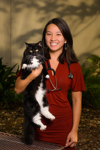 Auburn student Katie Xu Sedlaczek holds a cat named Zoe.