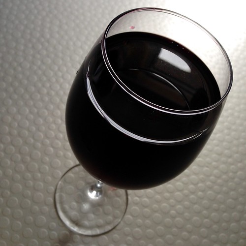 Red wine. Wine.  Wine glass.  Swirling glass.