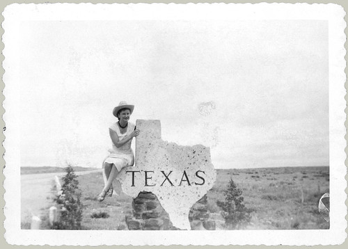 Sitting on a Texas Sign